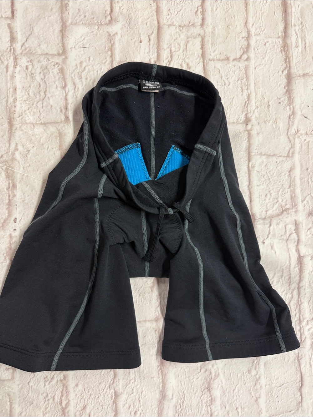 Canari Black Cycling padded Shorts with Gray Stitching and Blue Lining pads